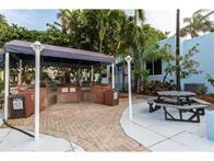 315 Van Buren Street, Unit 106B Hollywood, FL 33019 - Photo 9 of 14 Picnic and real barbecue at the complex
