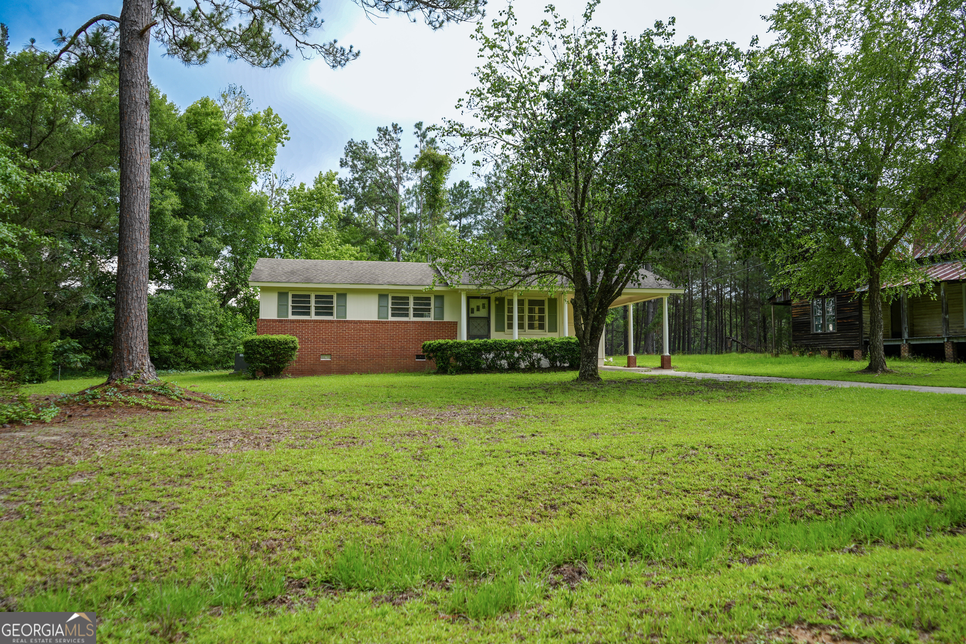 1869 Minter Blue Springs Road Rockledge, GA 30454 - Photo 9 of 45 a house view with a garden space