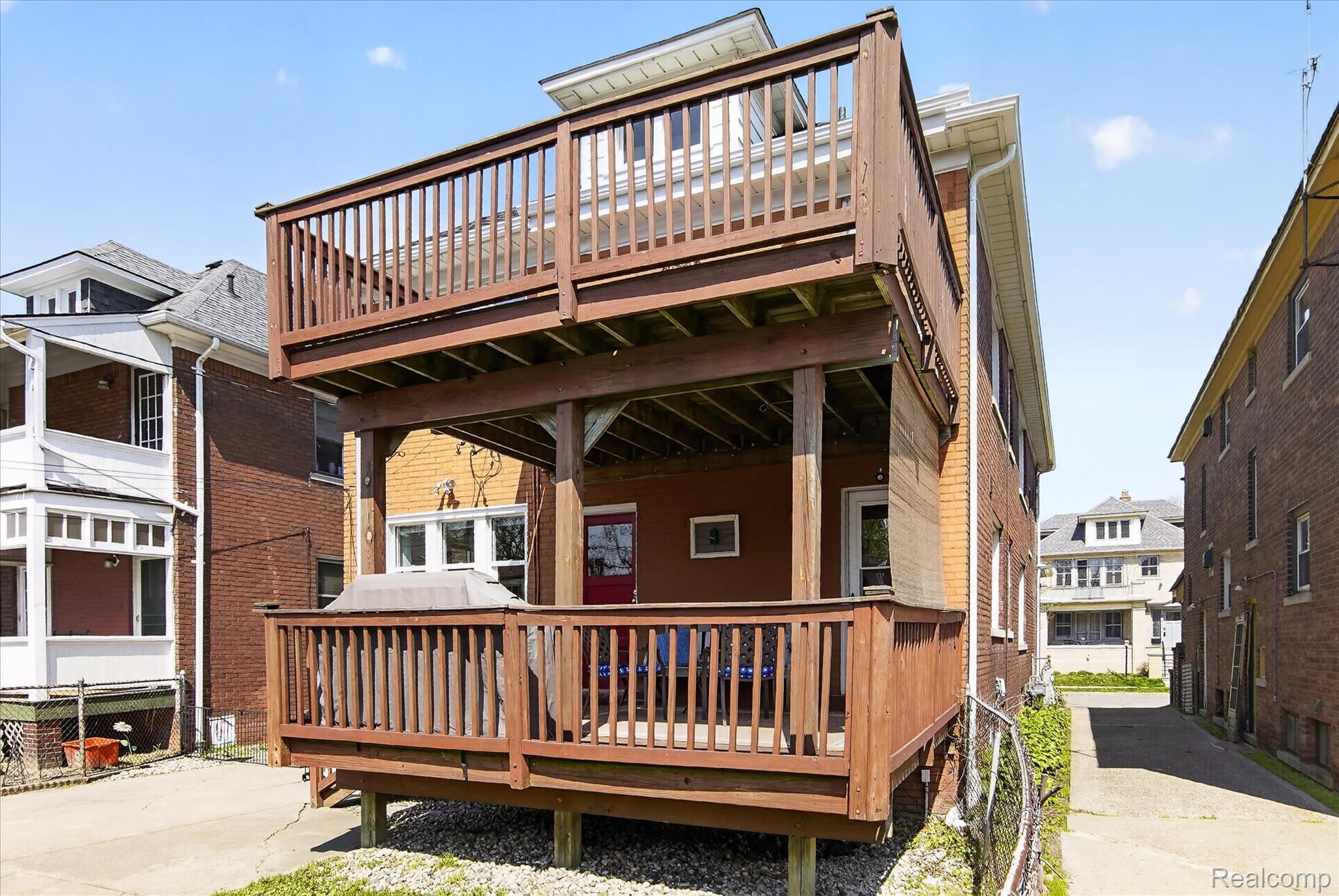 925 Nottingham Road Grosse Pointe, MI 48230 - Photo 42 of 46 Back of house with a wooden deck