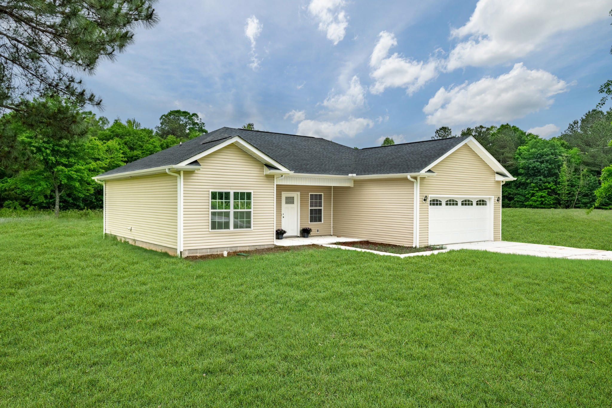 23101 Austin Whitt Road Ardmore, TN 38449 - Photo 2 of 35 a view of a house with a yard