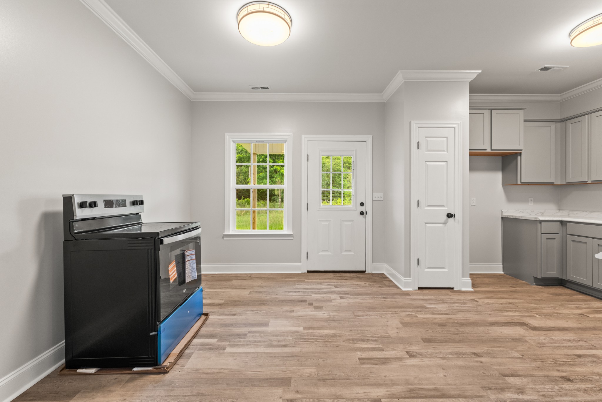 23101 Austin Whitt Road Ardmore, TN 38449 - Photo 22 of 35 a view of empty room with wooden floor and window