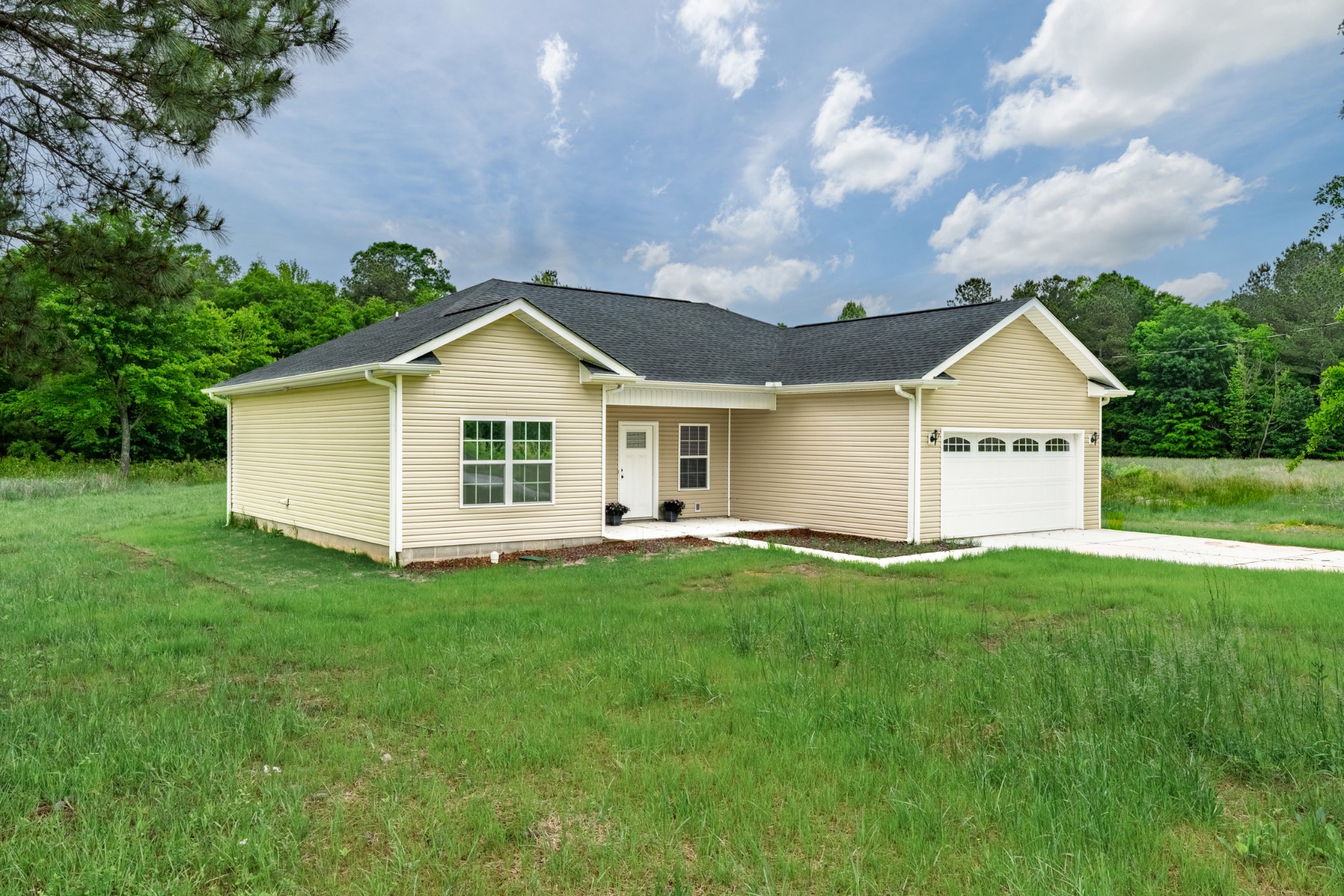 23101 Austin Whitt Road Ardmore, TN 38449 - Photo 3 of 35 a view of a house with a yard