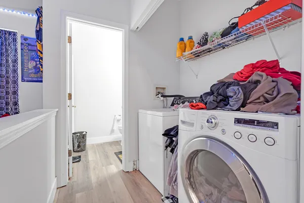 a utility room with dryer and washer