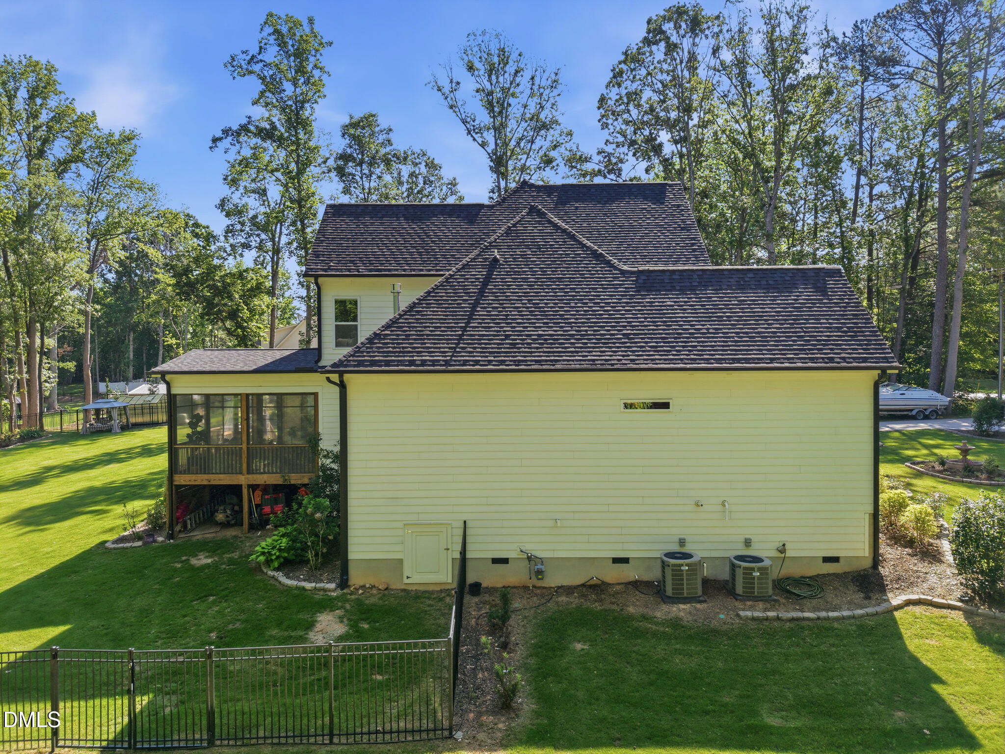 3511 Bruce Garner Road Wake Forest, NC 27587 - Photo 46 of 56 a front view of a house with garden