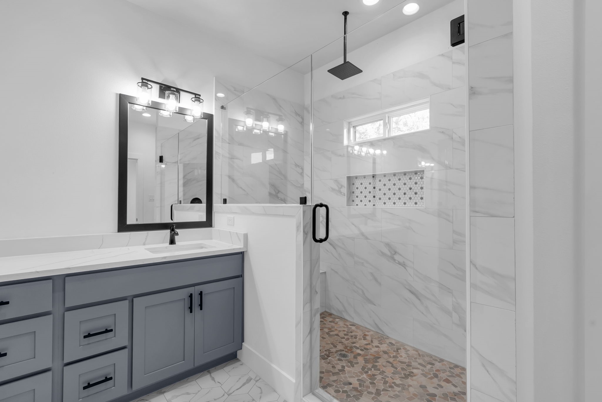 8136 Chateau Street Houston, TX 77028 - Photo 36 of 46 Large walk in shower with bench