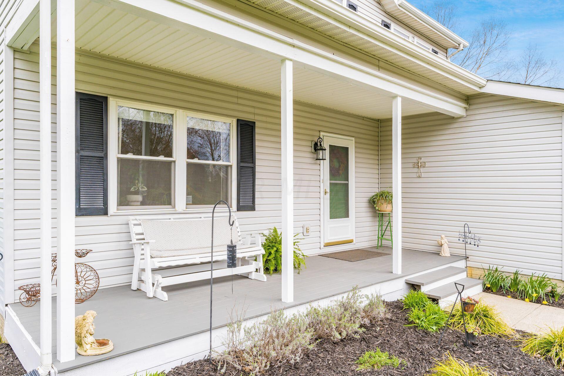 10950 Heimberger Road Northwest Baltimore, OH 43105 - Photo 13 of 45 Welcoming Covered Front Porch