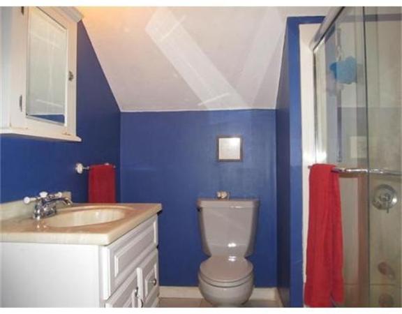 8 Fredrickson Road Billerica, MA 01821 - Photo 14 of 16 a bathroom with a toilet a sink and mirror