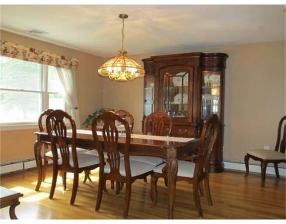 8 Fredrickson Road Billerica, MA 01821 - Photo 3 of 16 a view of a dining room with furniture and chandelier