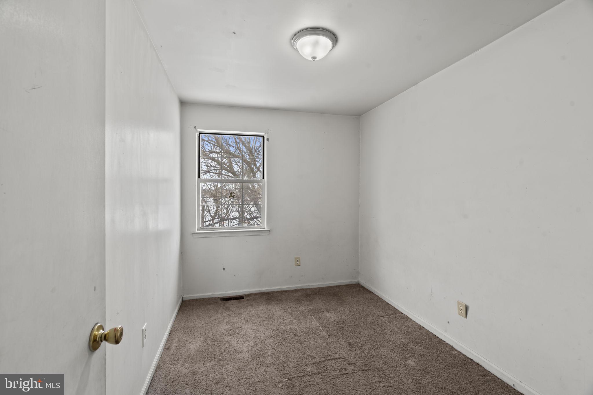 6500 Ditman Street Philadelphia, PA 19135 - Photo 12 of 30 an empty room with a workbench