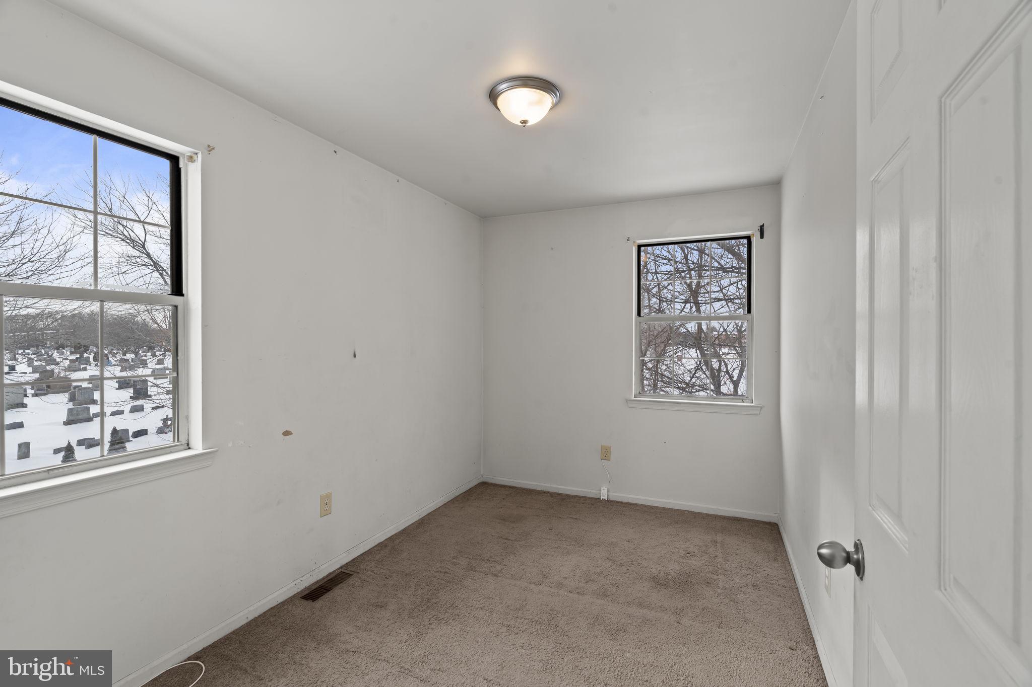 6500 Ditman Street Philadelphia, PA 19135 - Photo 14 of 30 an empty room with windows