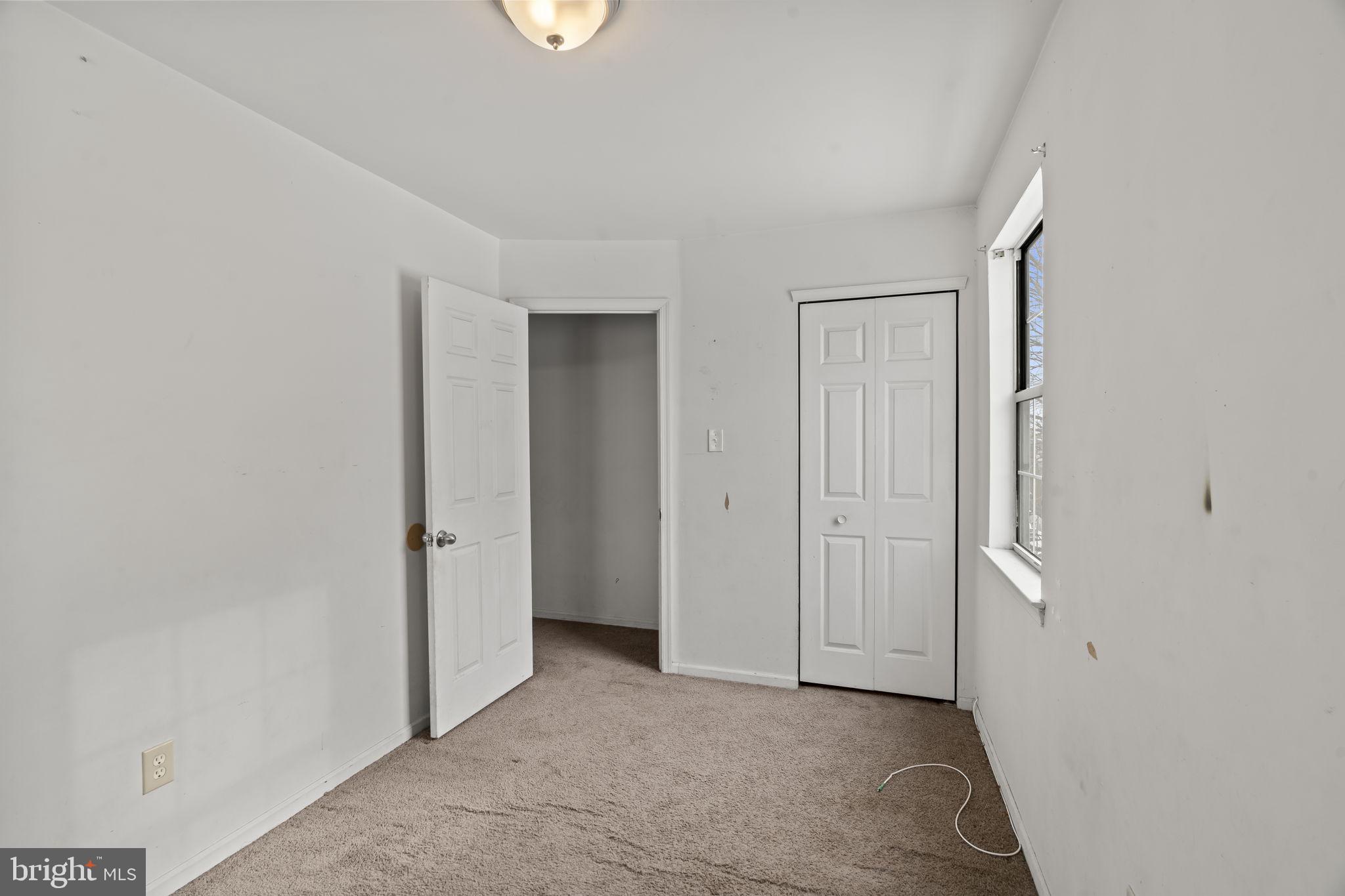 6500 Ditman Street Philadelphia, PA 19135 - Photo 15 of 30 an empty room with windows