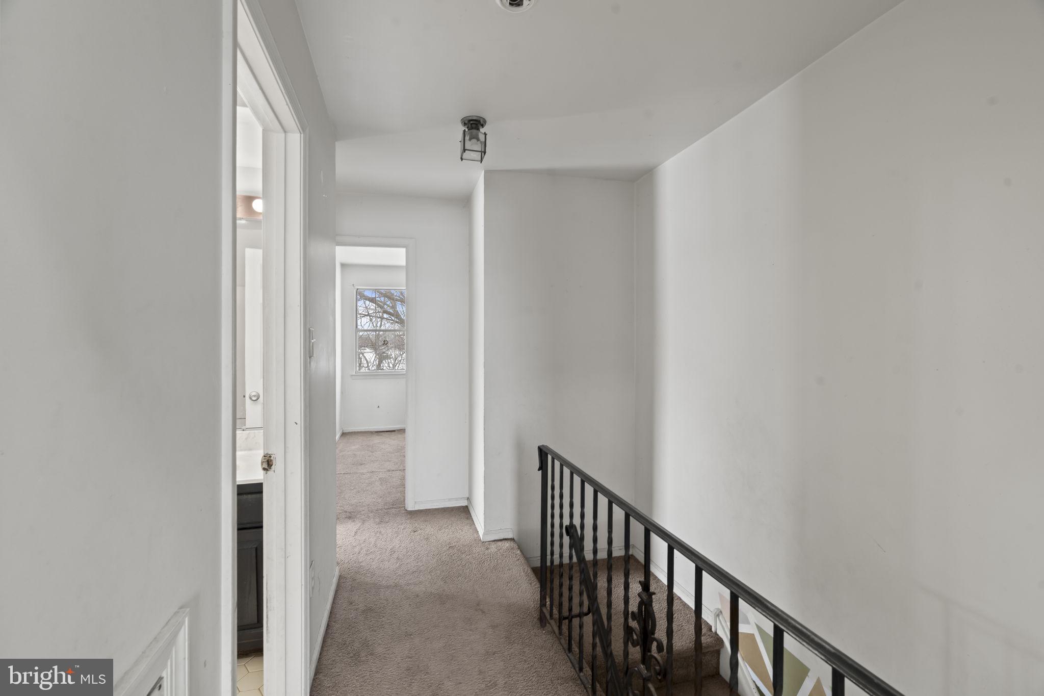 6500 Ditman Street Philadelphia, PA 19135 - Photo 18 of 30 a view of a hallway with wooden floor and entryway