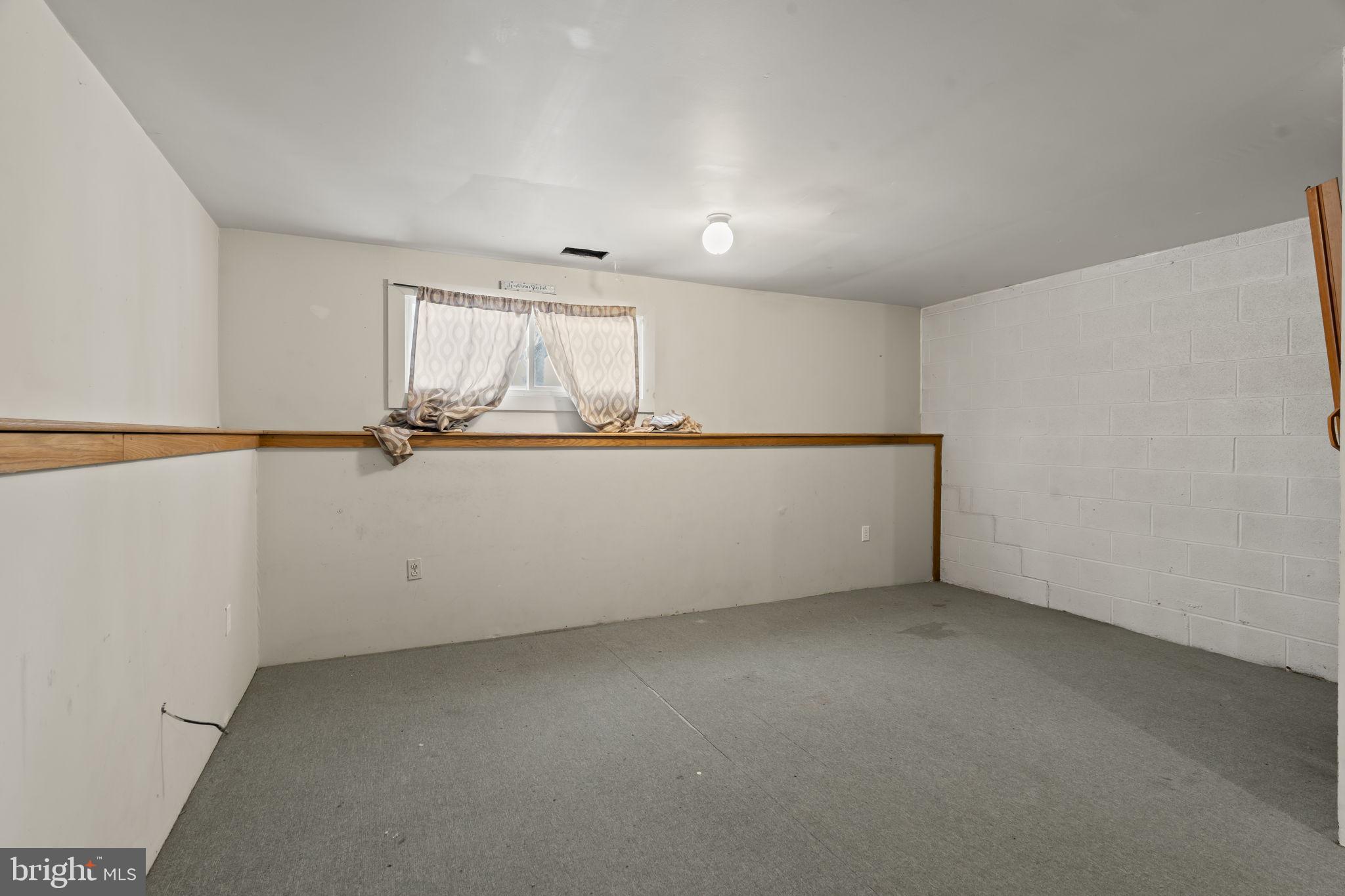 6500 Ditman Street Philadelphia, PA 19135 - Photo 26 of 30 an empty room with a window