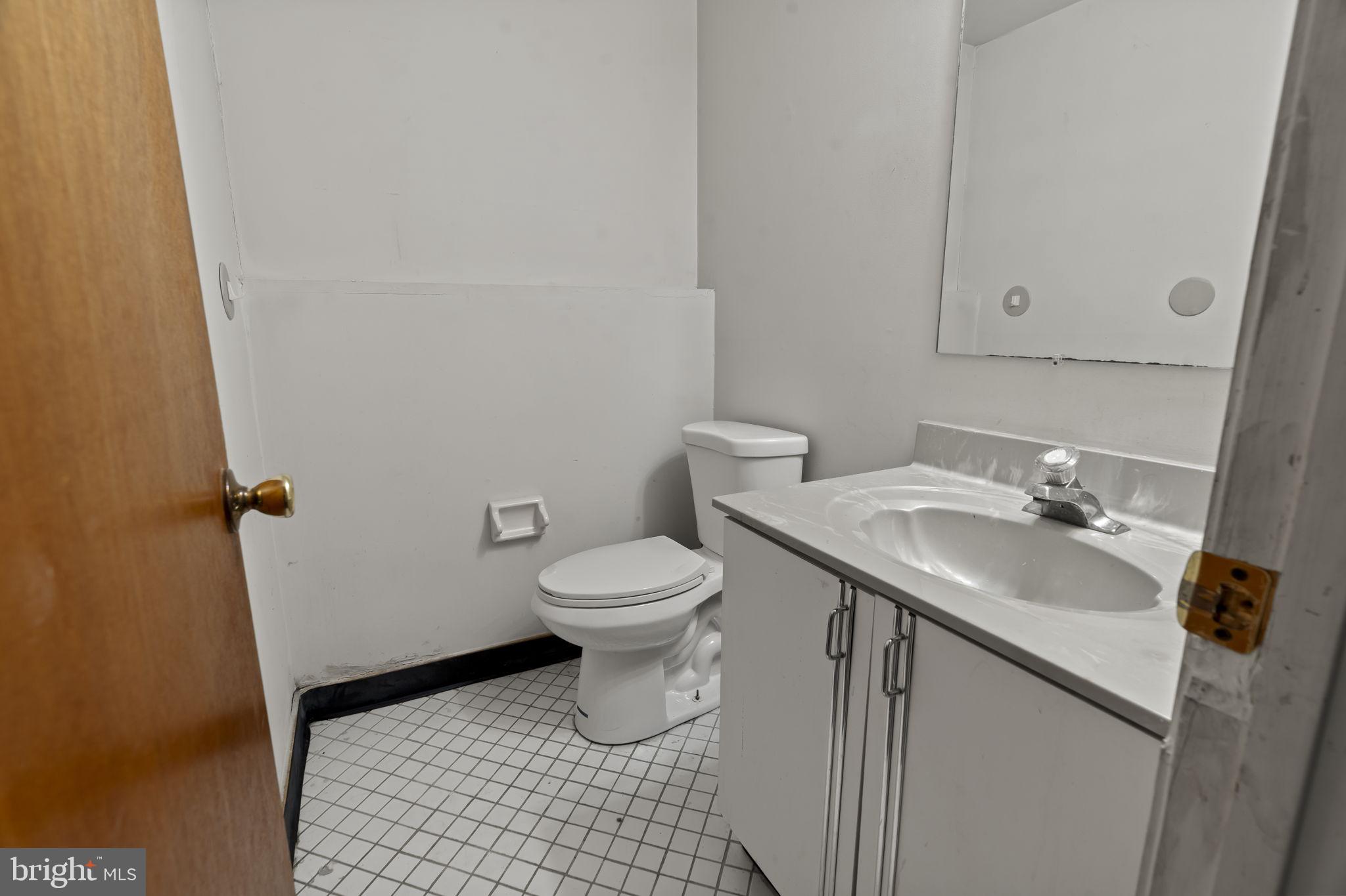 6500 Ditman Street Philadelphia, PA 19135 - Photo 30 of 30 a bathroom with a sink and a toilet