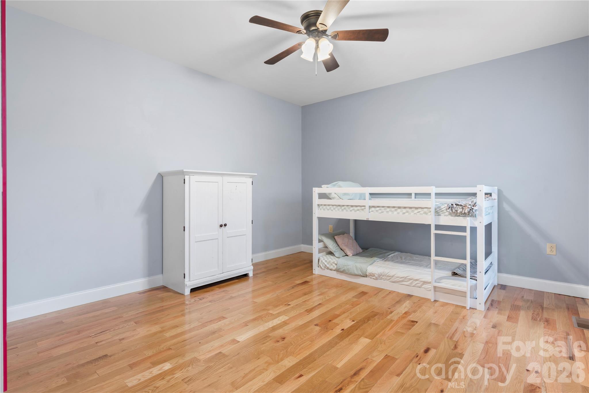 111 Pinewood Road Granite Falls, NC 28630 - Photo 21 of 33 a bedroom with a bunk bed and a window