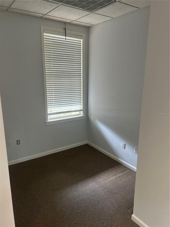 5214 Southwest 91 Terrace Gainesville, FL 32608 - Photo 9 of 9 an empty room with a window