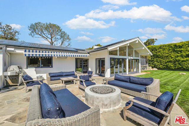 a bedroom with furniture and a bed