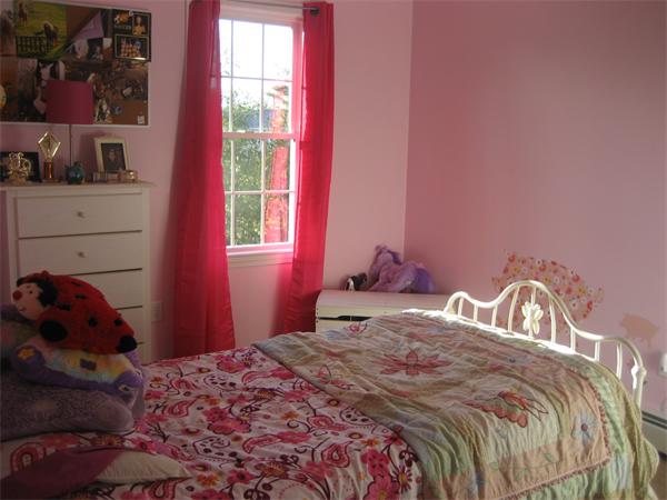 11 Comstock Place Rochester, MA 02770 - Photo 15 of 21 a bedroom with a bed and a window