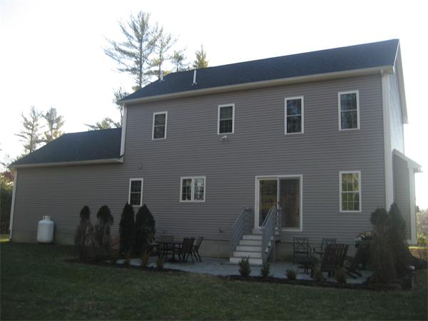 11 Comstock Place Rochester, MA 02770 - Photo 4 of 21 a view of a house with backyard