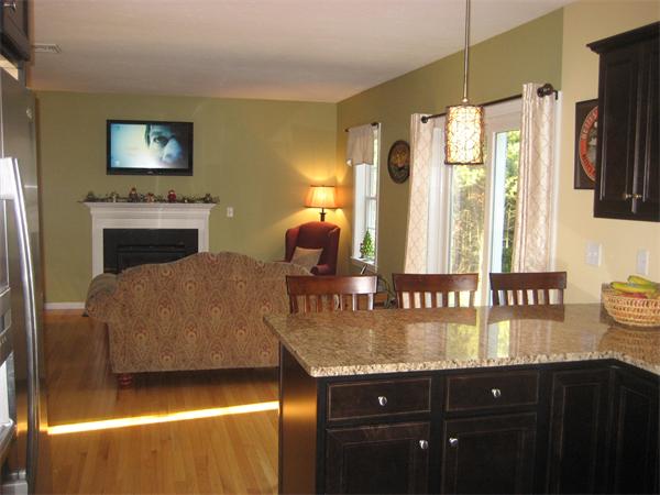 11 Comstock Place Rochester, MA 02770 - Photo 8 of 21 a kitchen with a refrigerator and a stove