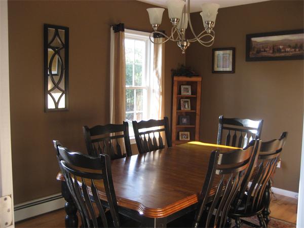 11 Comstock Place Rochester, MA 02770 - Photo 9 of 21 a view of a dining room with furniture and window