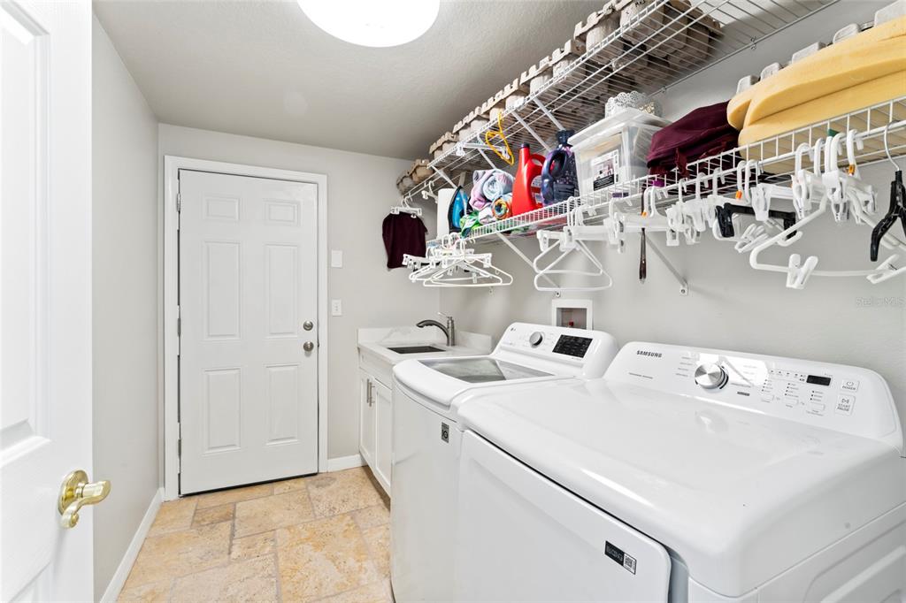 12833 Darby Ridge Drive Tampa, FL 33624 - Photo 33 of 33 a utility room with dryer and washer