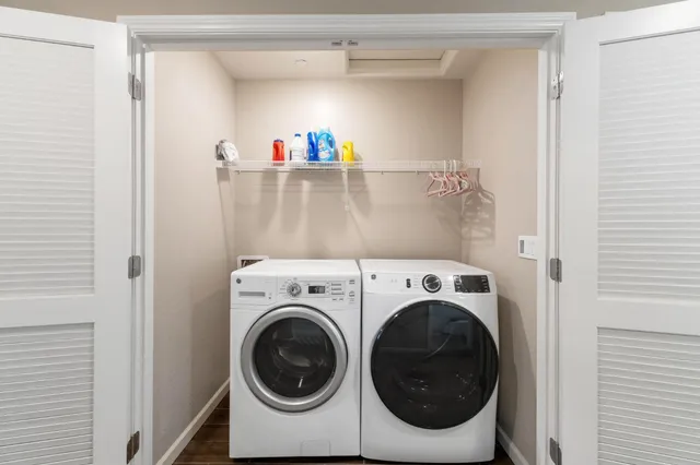 a utility room with dryer and washer