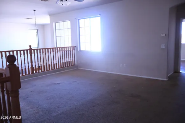 a view of a room with a hallway