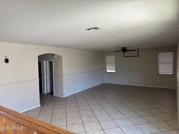 a kitchen with a table chairs and a stove