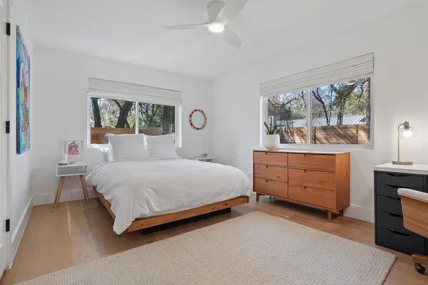 a view of a bathroom with a sink and a bathroom