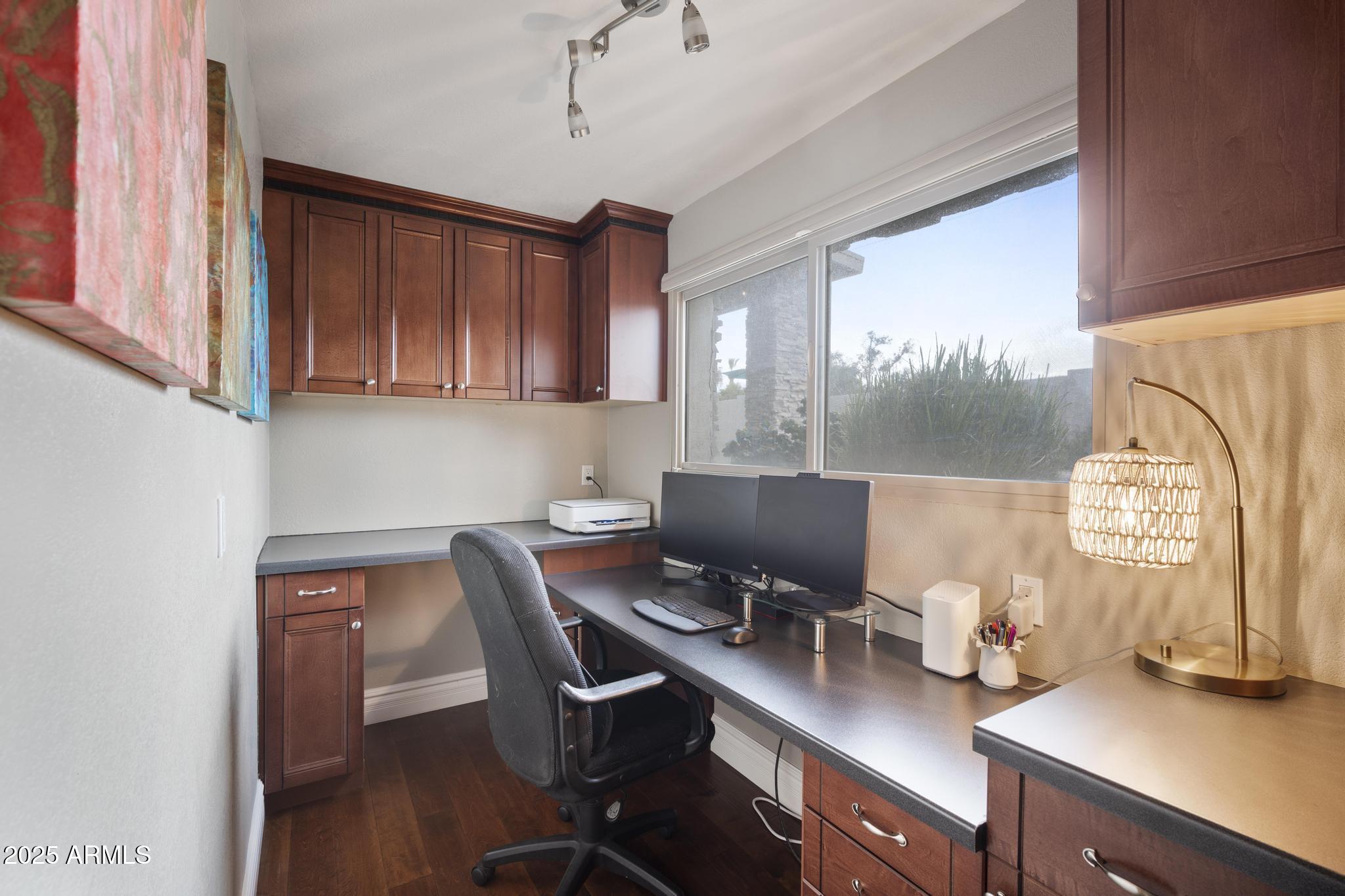 3912 South Elm Street Tempe, AZ 85282 - Photo 15 of 33 a view of a workspace with furniture and a window