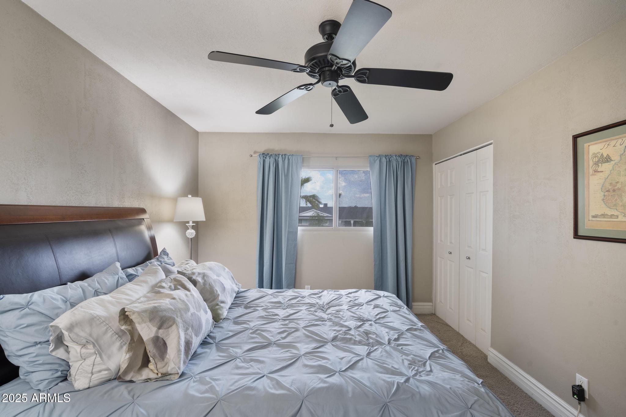 3912 South Elm Street Tempe, AZ 85282 - Photo 19 of 33 a bedroom with a bed and a window