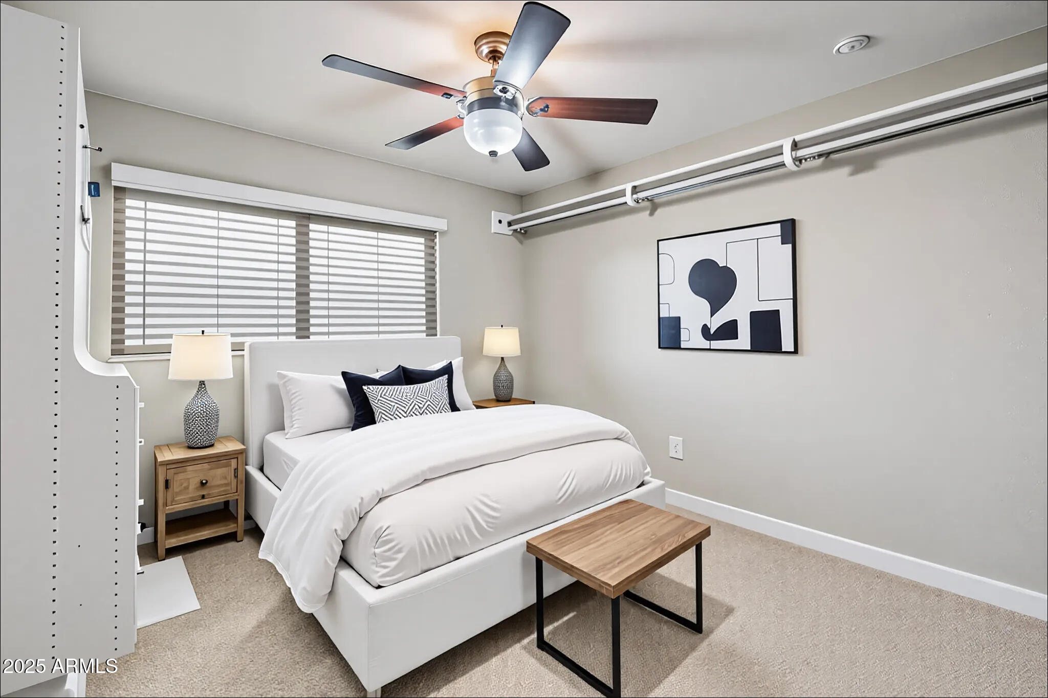 3912 South Elm Street Tempe, AZ 85282 - Photo 21 of 33 a bedroom with a bed and a chandelier
