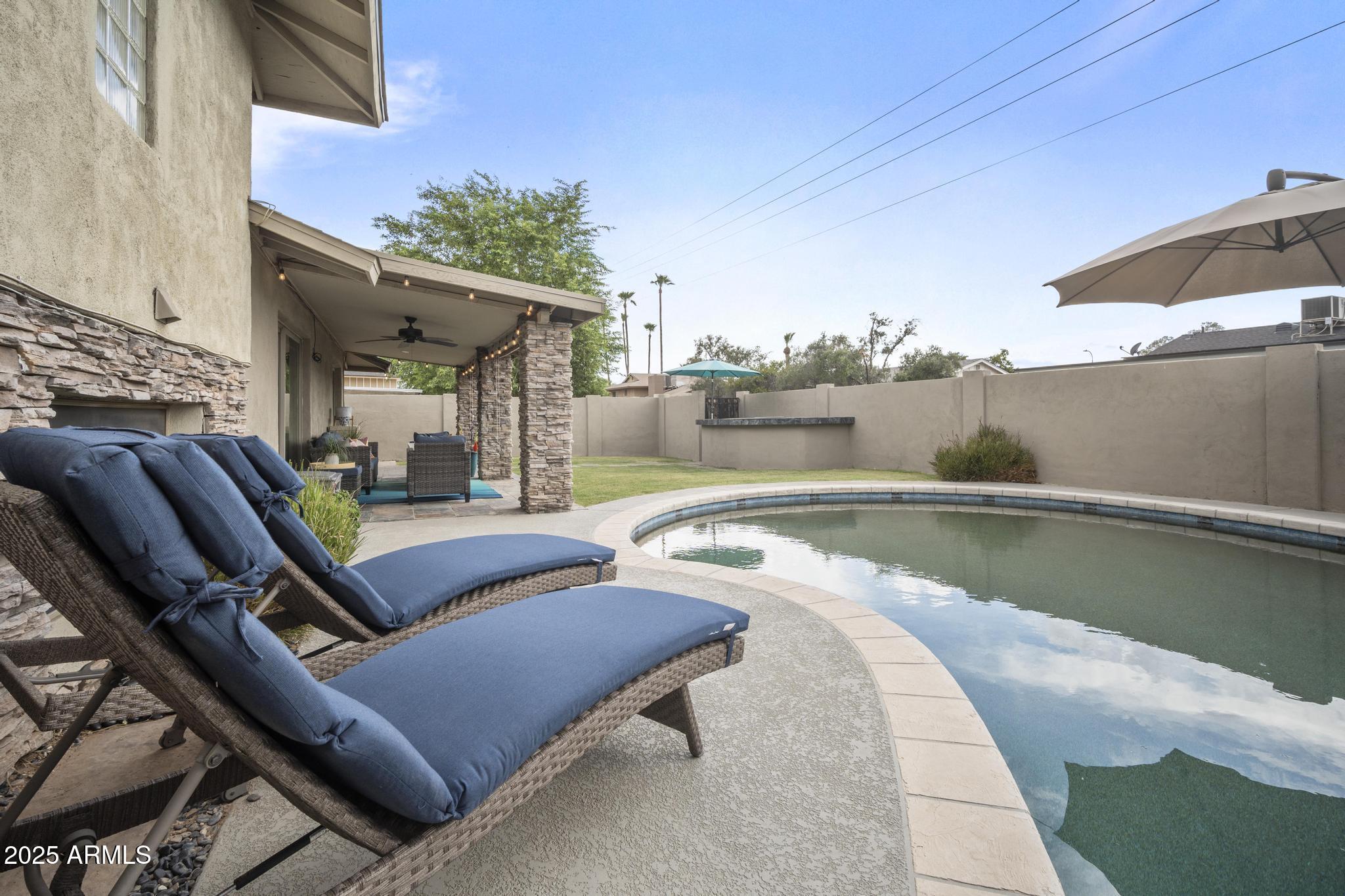3912 South Elm Street Tempe, AZ 85282 - Photo 29 of 33 swimming pool view with seating space