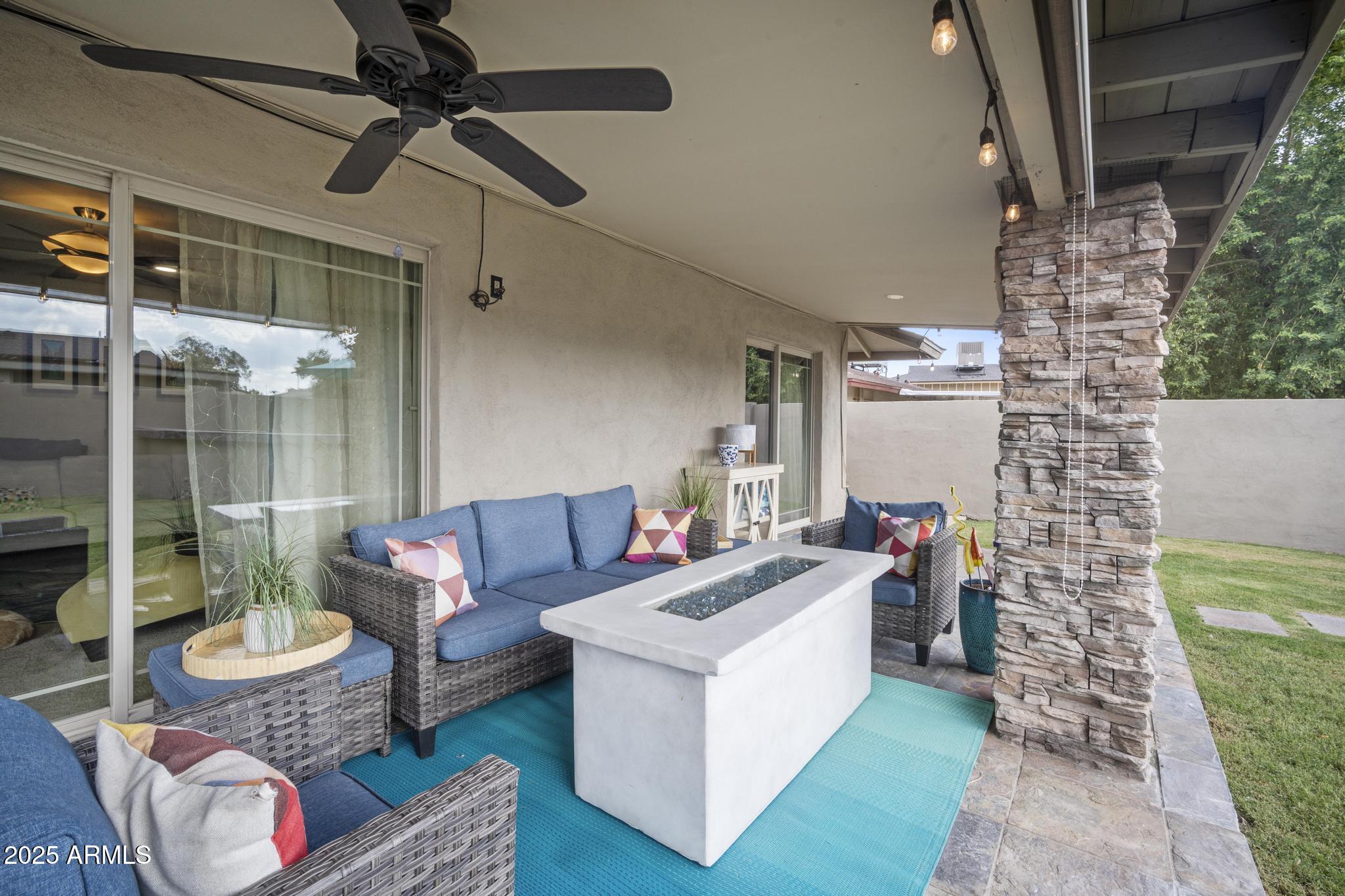3912 South Elm Street Tempe, AZ 85282 - Photo 30 of 33 a living room with furniture and a yard