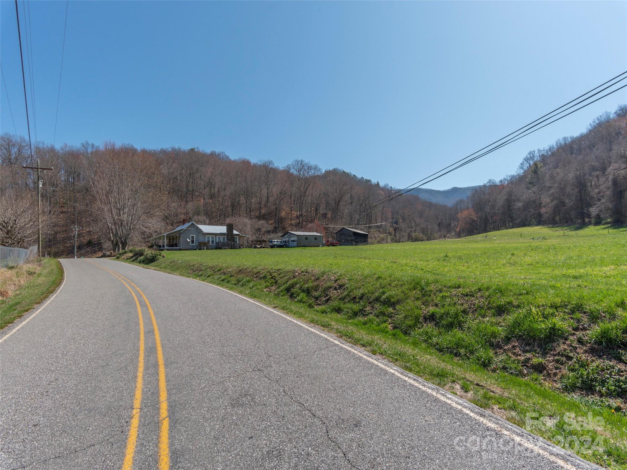 0 Camp Branch Road Waynesville, NC 28786 - Photo 8 of 8 a view of a field with a yard