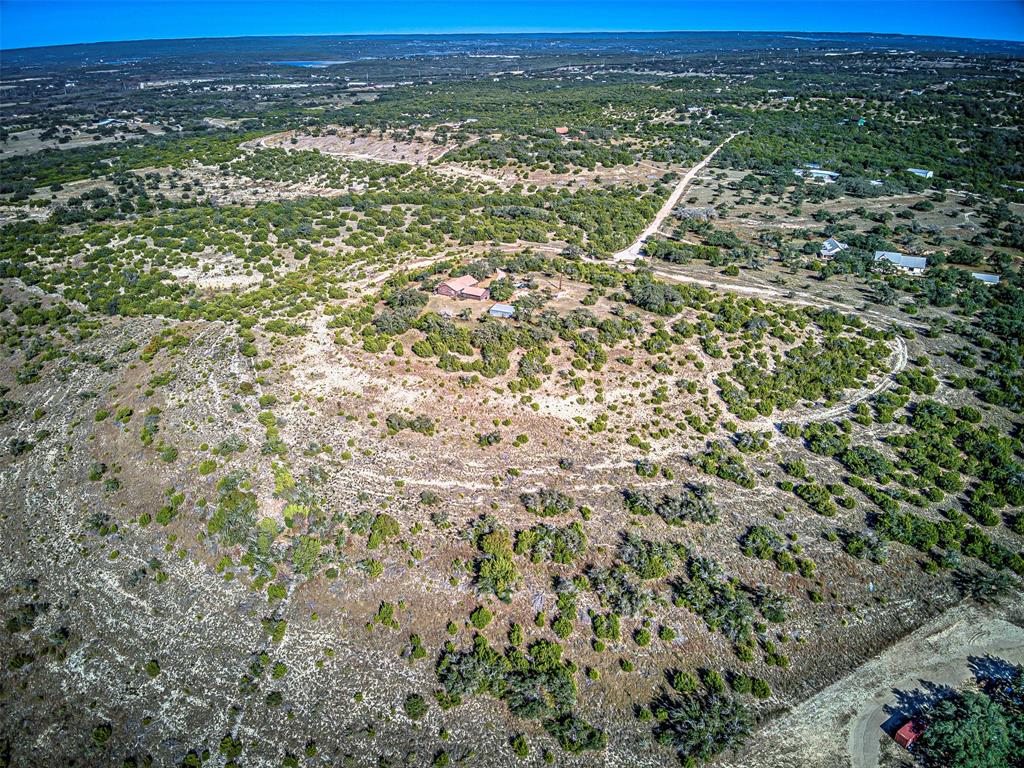 414 Hall Lane Spicewood, TX 78669 - Photo 7 of 16 a view of a city with lush green field