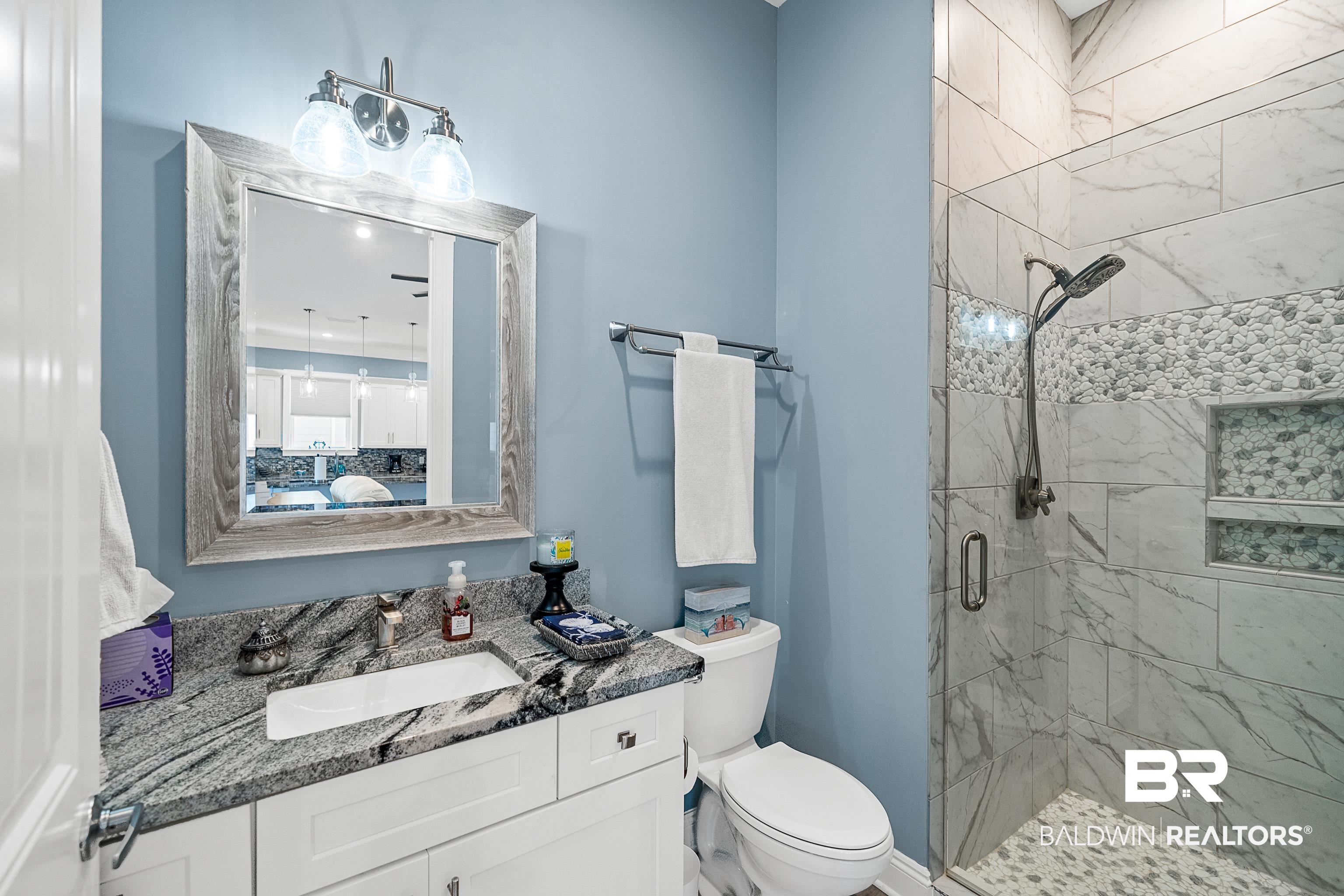 12329 Reunion Place, Unit LOT 38 Foley, AL 36535 - Photo 17 of 43 Ensuite bathroom featuring a shower stall and vanity