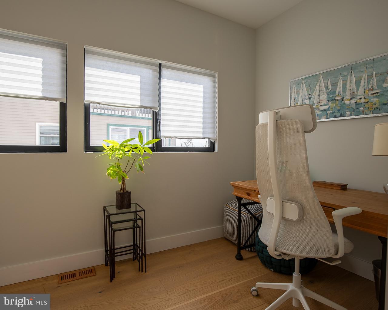 637 Cedar Run Dock Road West Creek, NJ 08092 - Photo 24 of 50 a view of a workspace with furniture and a window