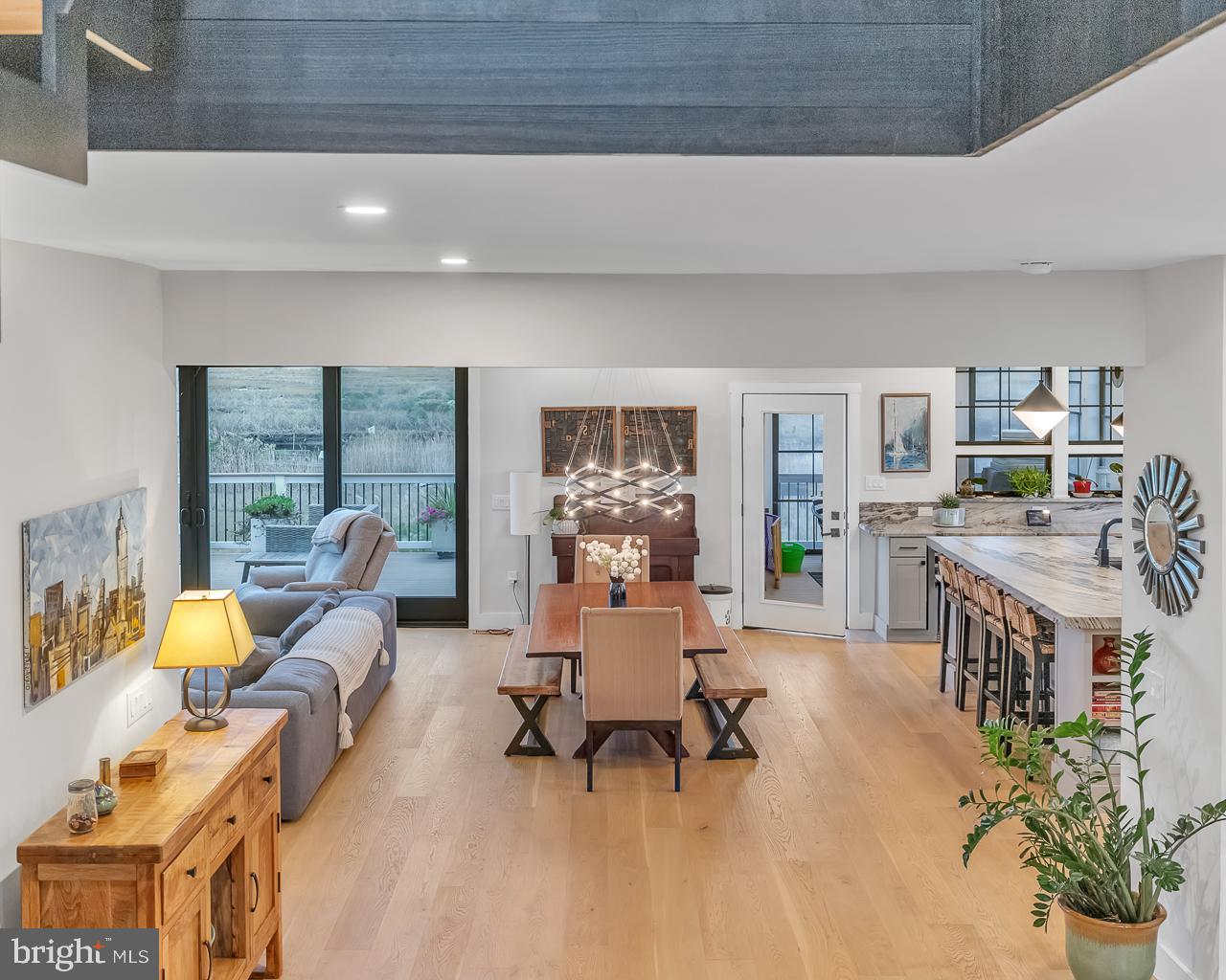 637 Cedar Run Dock Road West Creek, NJ 08092 - Photo 6 of 50 a living room with furniture and a large window