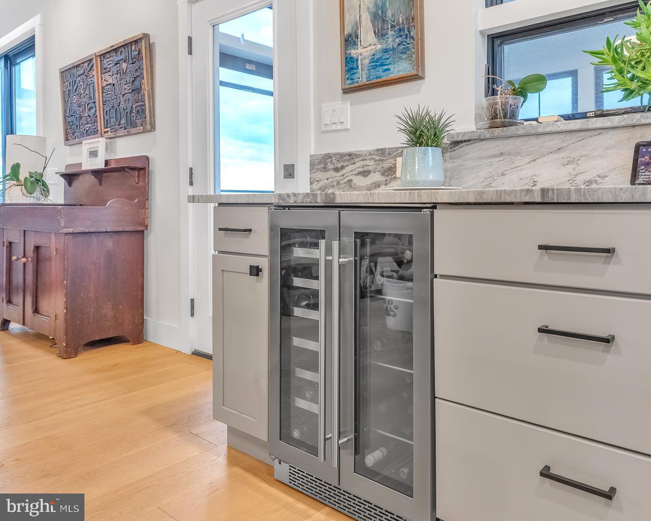 637 Cedar Run Dock Road West Creek, NJ 08092 - Photo 9 of 50 a bathroom with a granite countertop sink a mirror and a shower