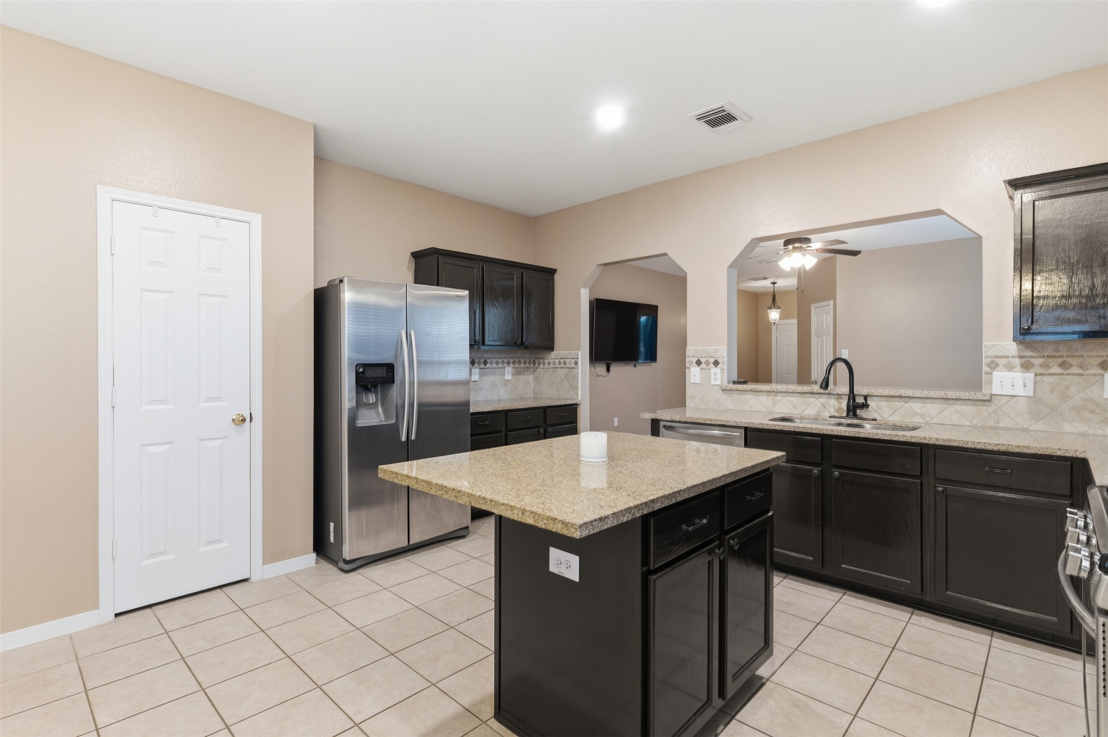 19710 Yaupon Ranch Drive Cypress, TX 77433 - Photo 14 of 34 a kitchen with a sink appliances and cabinets
