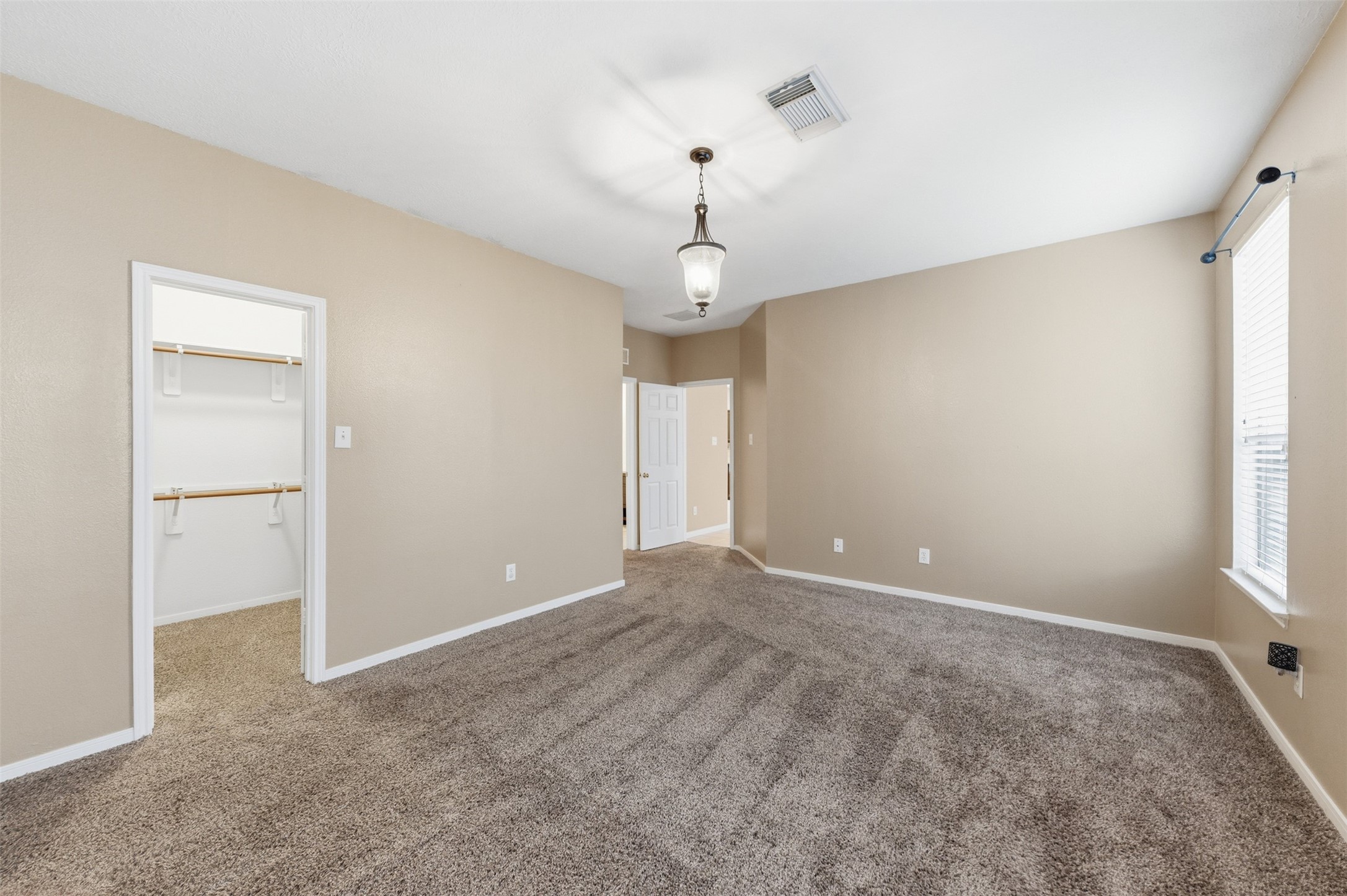 19710 Yaupon Ranch Drive Cypress, TX 77433 - Photo 21 of 34 a view of an empty room with a window