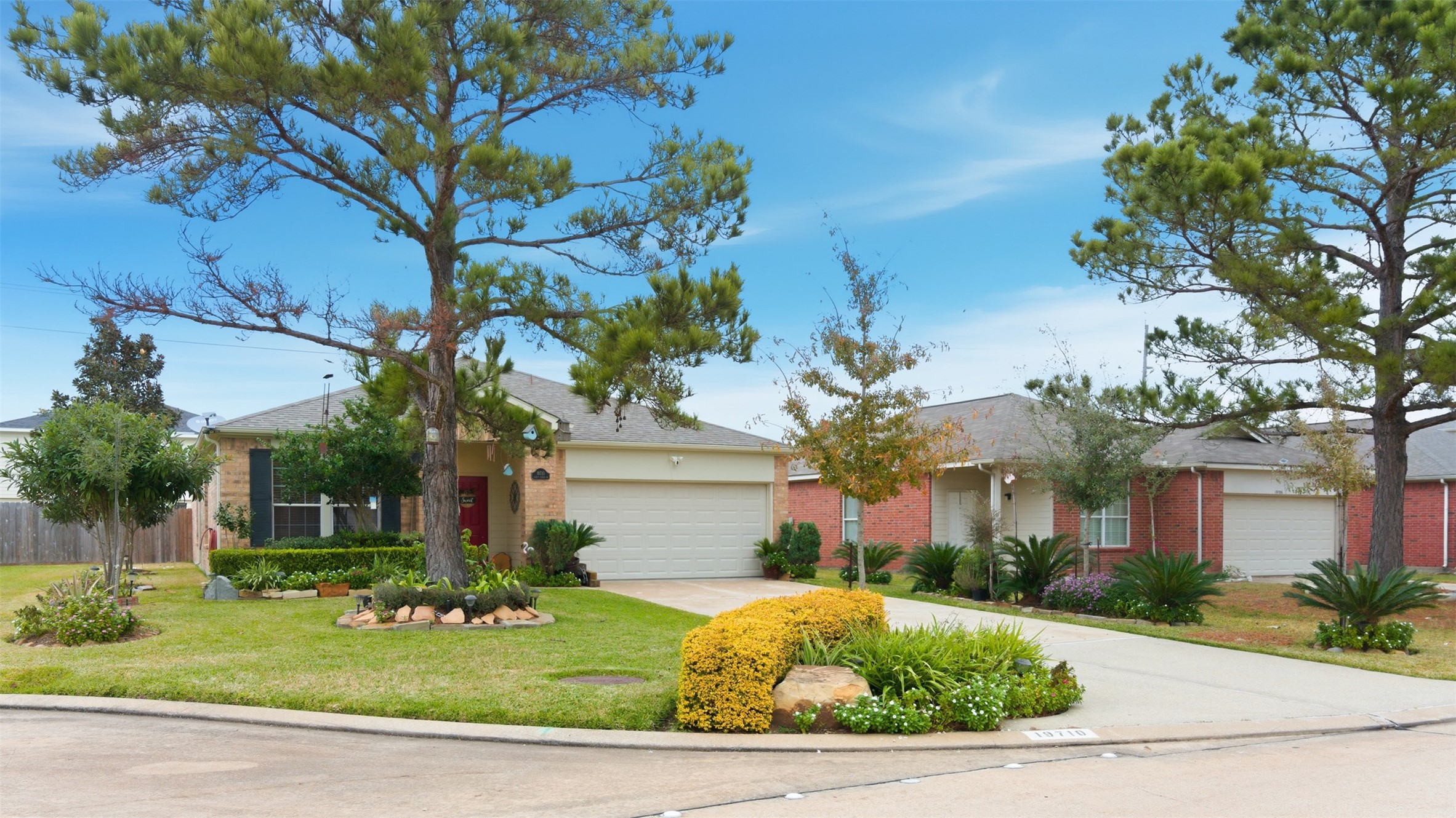 19710 Yaupon Ranch Drive Cypress, TX 77433 - Photo 3 of 34 a front view of a house with garden