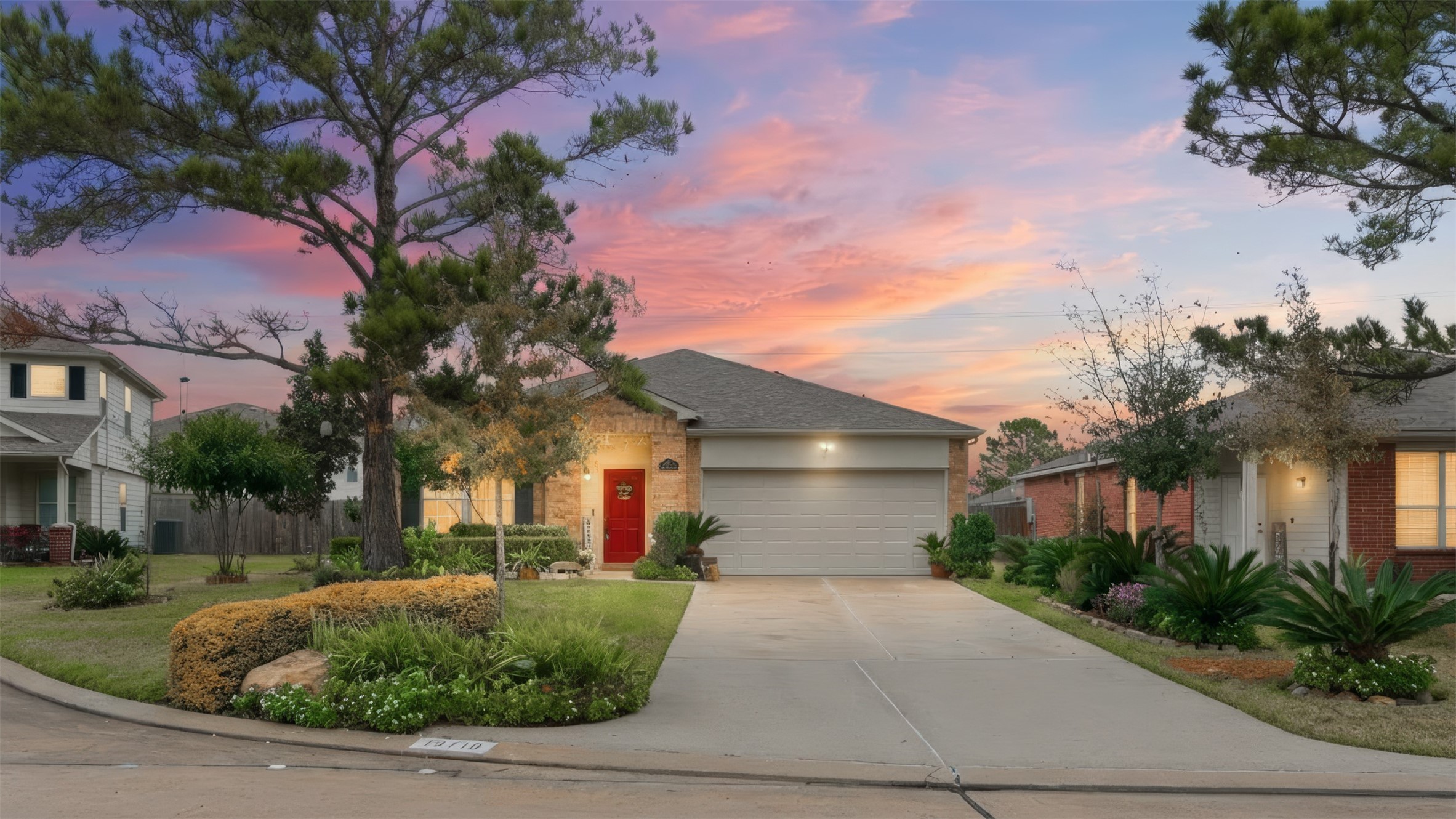 19710 Yaupon Ranch Drive Cypress, TX 77433 - Photo 34 of 34 a front view of a house with garden