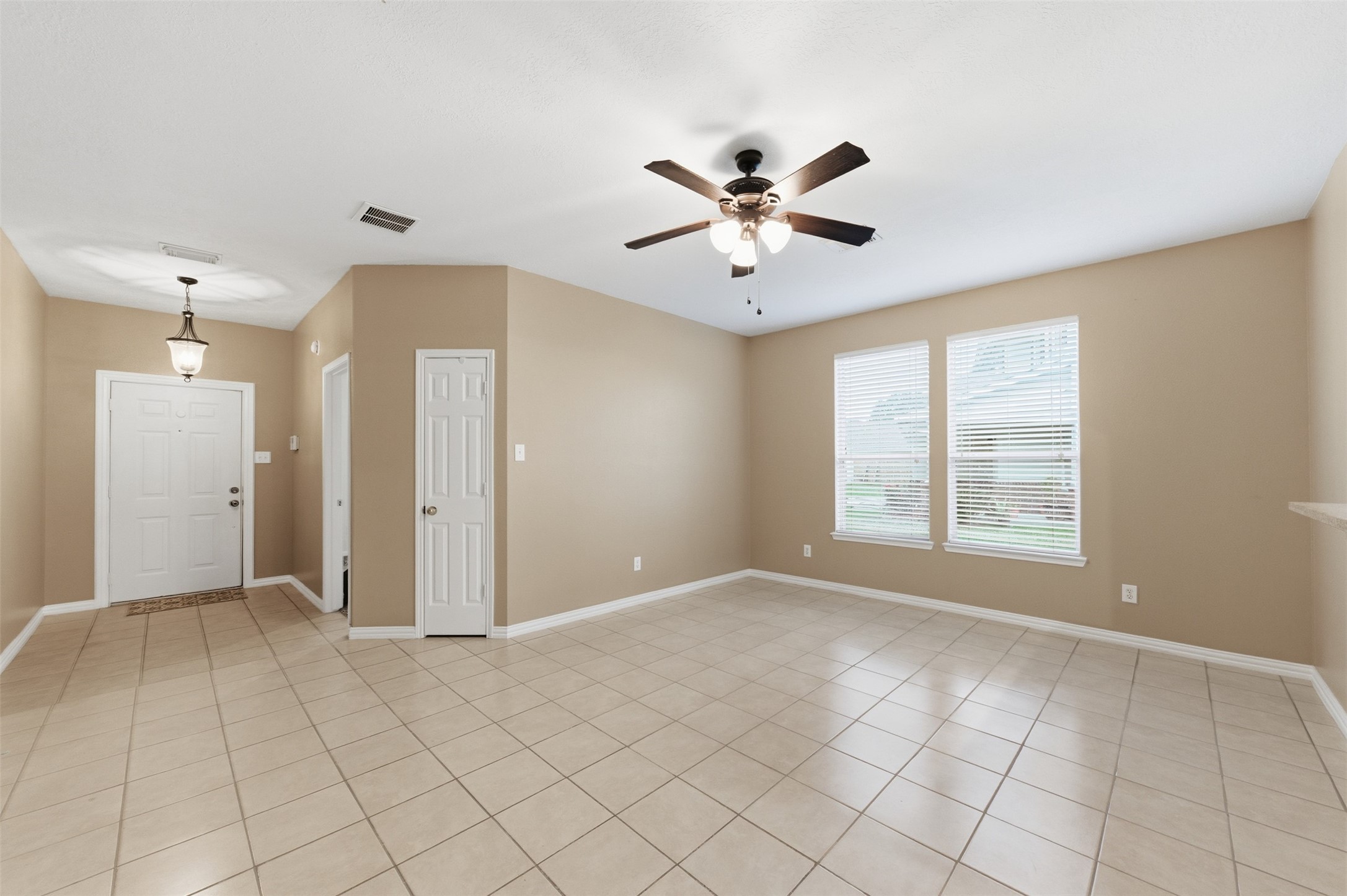 19710 Yaupon Ranch Drive Cypress, TX 77433 - Photo 6 of 34 a view of an empty room with a window