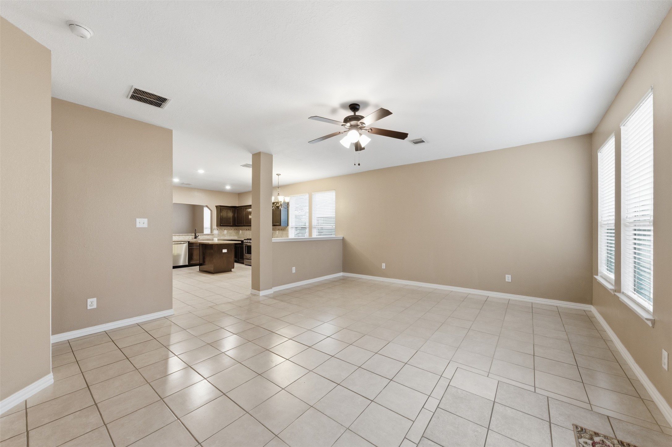 19710 Yaupon Ranch Drive Cypress, TX 77433 - Photo 7 of 34 a view of a kitchen with a sink and a window