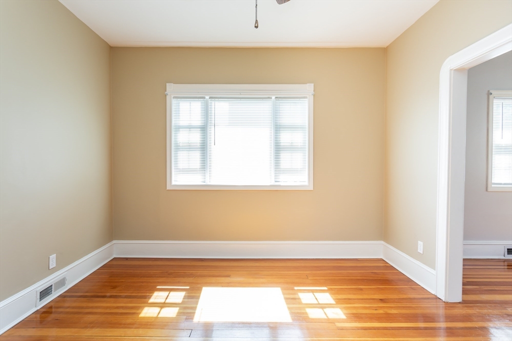 2714 Riverside Avenue Somerset, MA 02726 - Photo 14 of 36 a view of a room with wooden floor and a window