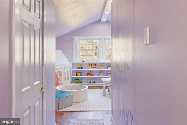 a room with a white walls and a window