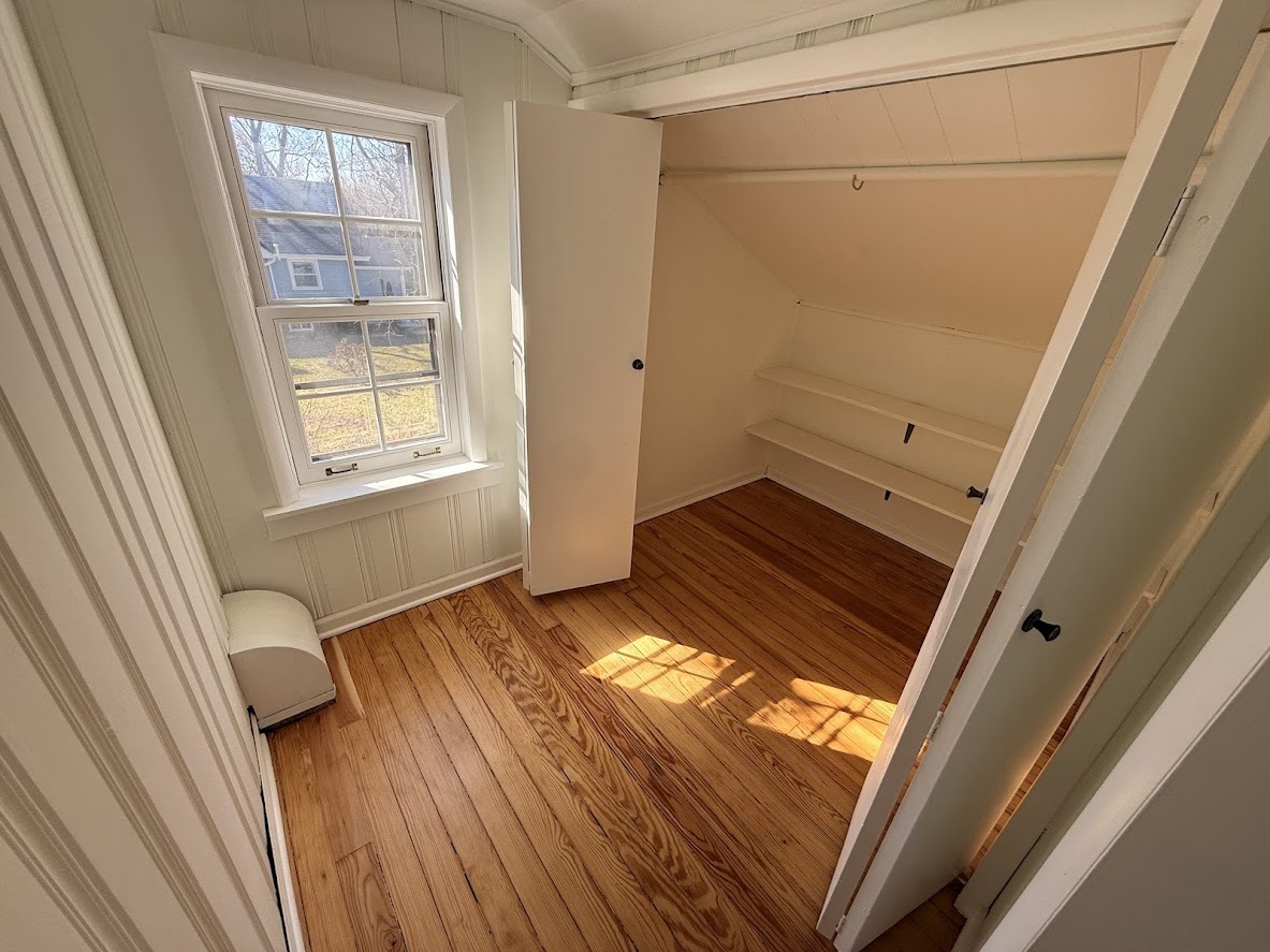 18404 Dixie Highway Homewood, IL 60430 - Photo 13 of 20 a view of an empty room with wooden floor and a window
